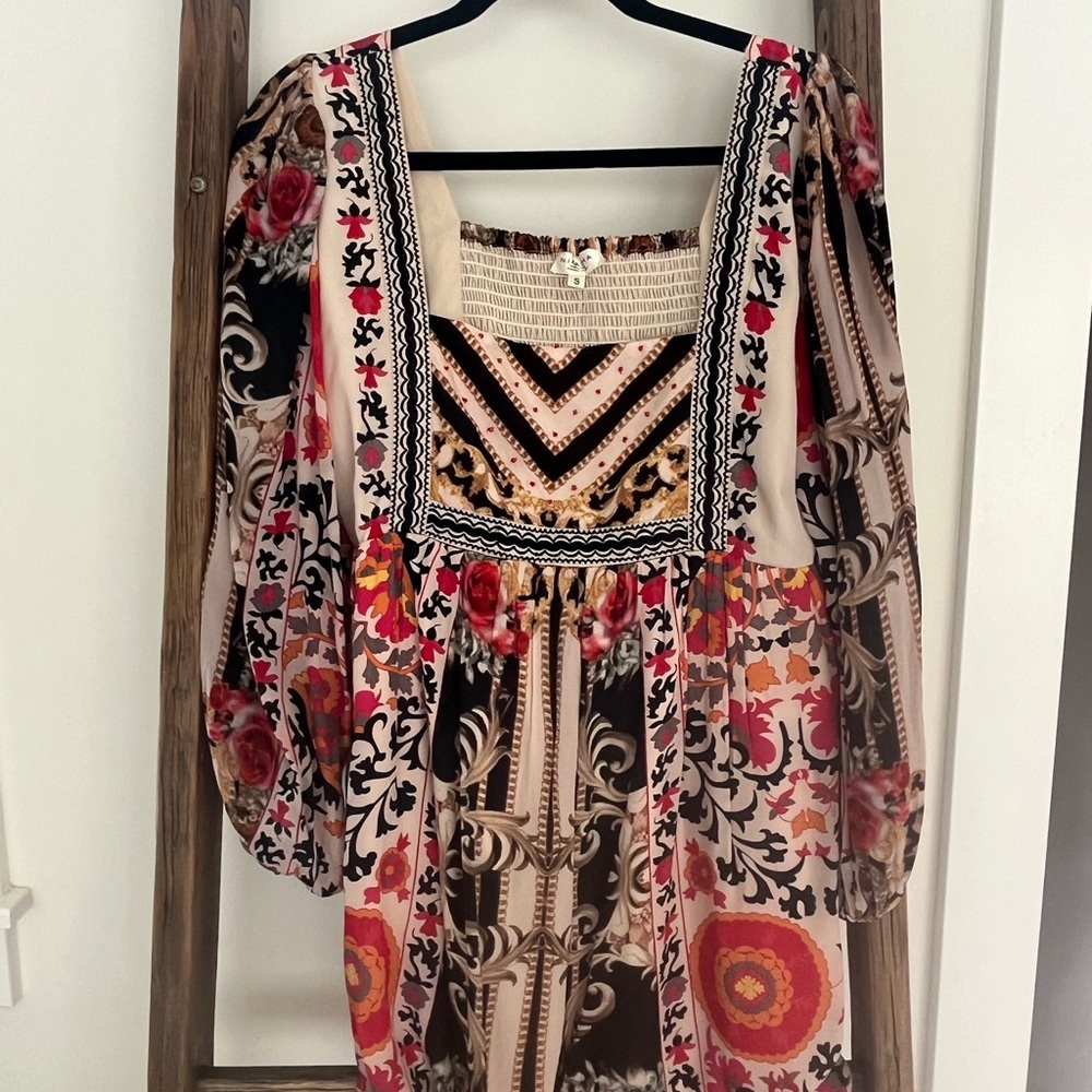 Lovely holiday dress with warm colors.